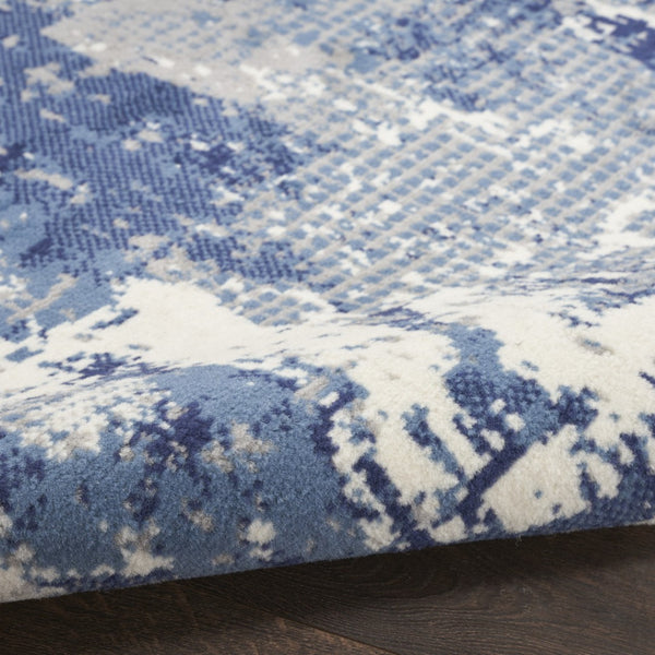 HomeRoots 9' Modern Blue Abstract Area Rug – Power Loomed for Durability and Style in Any Living Space 9' X 12' 569869