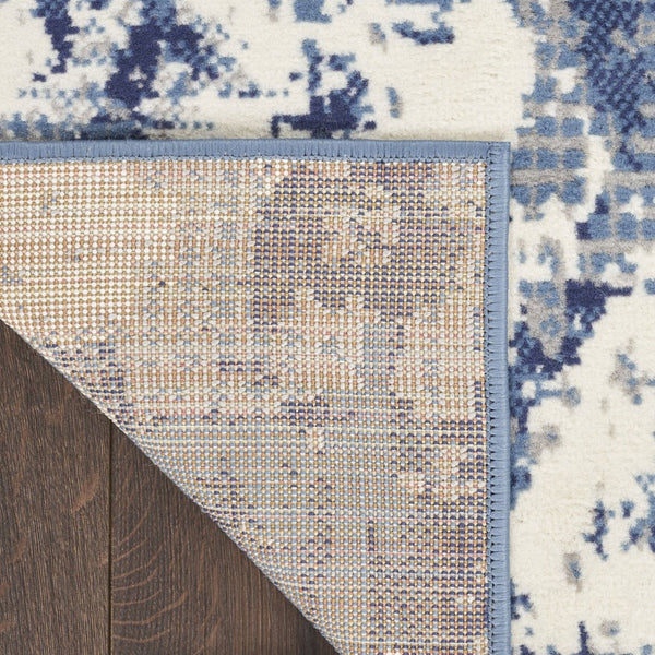 HomeRoots 9' Modern Blue Abstract Area Rug – Power Loomed for Durability and Style in Any Living Space 9' X 12' 569869