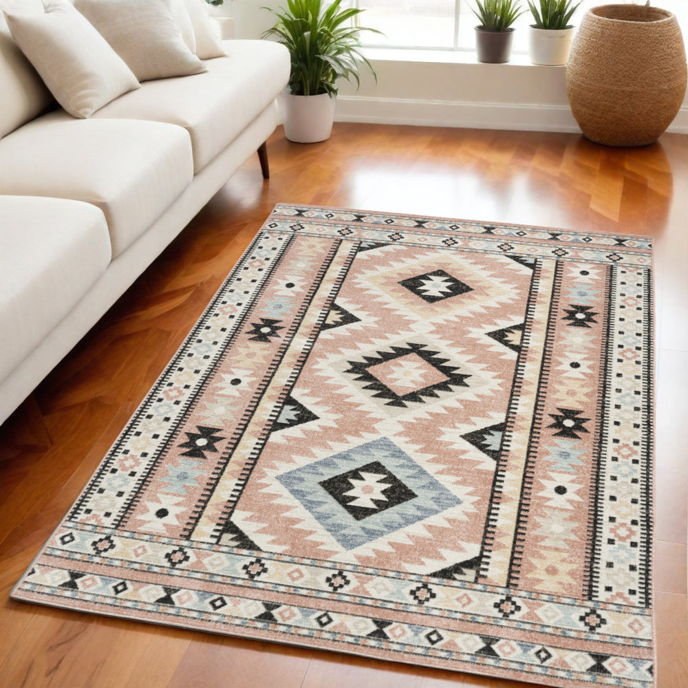 Homeroots 5' X 7' Ivory Pink & Black Geometric Flatweave Area Rug - Durable, Stain Resistant, Bohemian Style  Polyester 569902
