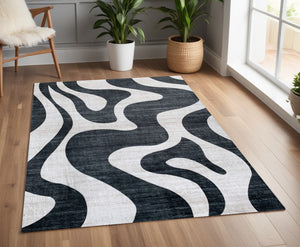 Homeroots 4' X 6' Black And White Zebra Print Area Rug  Polyester 570047