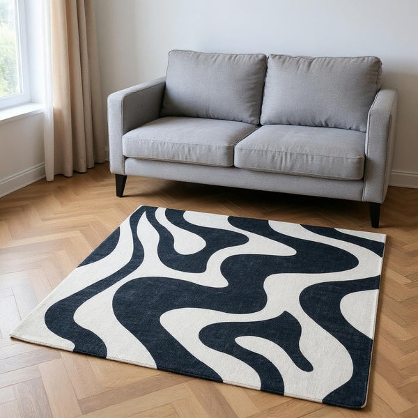 HomeRoots 5' Bold Black and White Zebra Print Area Rug - Modern Design, Durable, Stain-Resistant, Easy Care 5' X 8' 570048