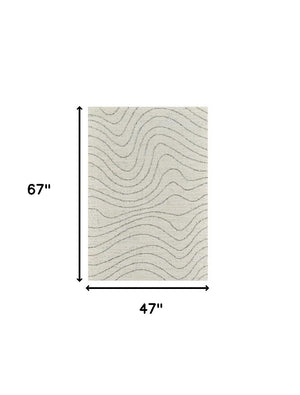 Homeroots 4' X 6' Cream And Beige Abstract Area Rug  Polyester 570063