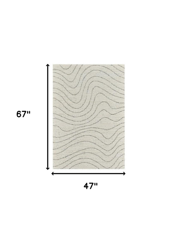 Homeroots 4' X 6' Cream And Beige Abstract Area Rug  Polyester 570063