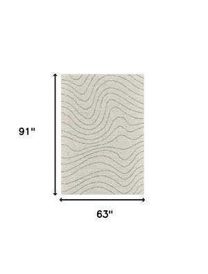 Homeroots 5' X 8' Cream And Beige Abstract Area Rug  Polyester 570064