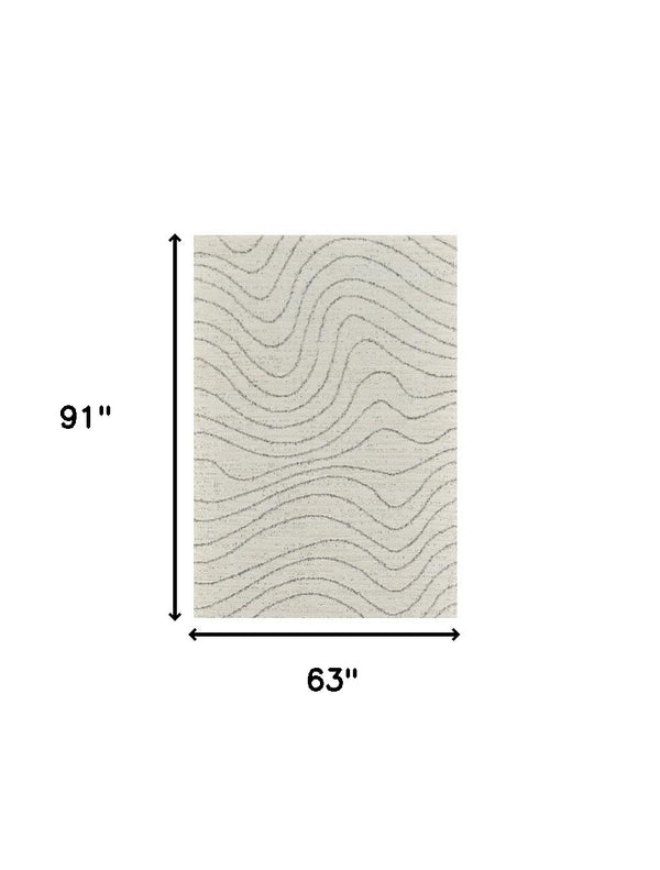 Homeroots 5' X 8' Cream And Beige Abstract Area Rug  Polyester 570064