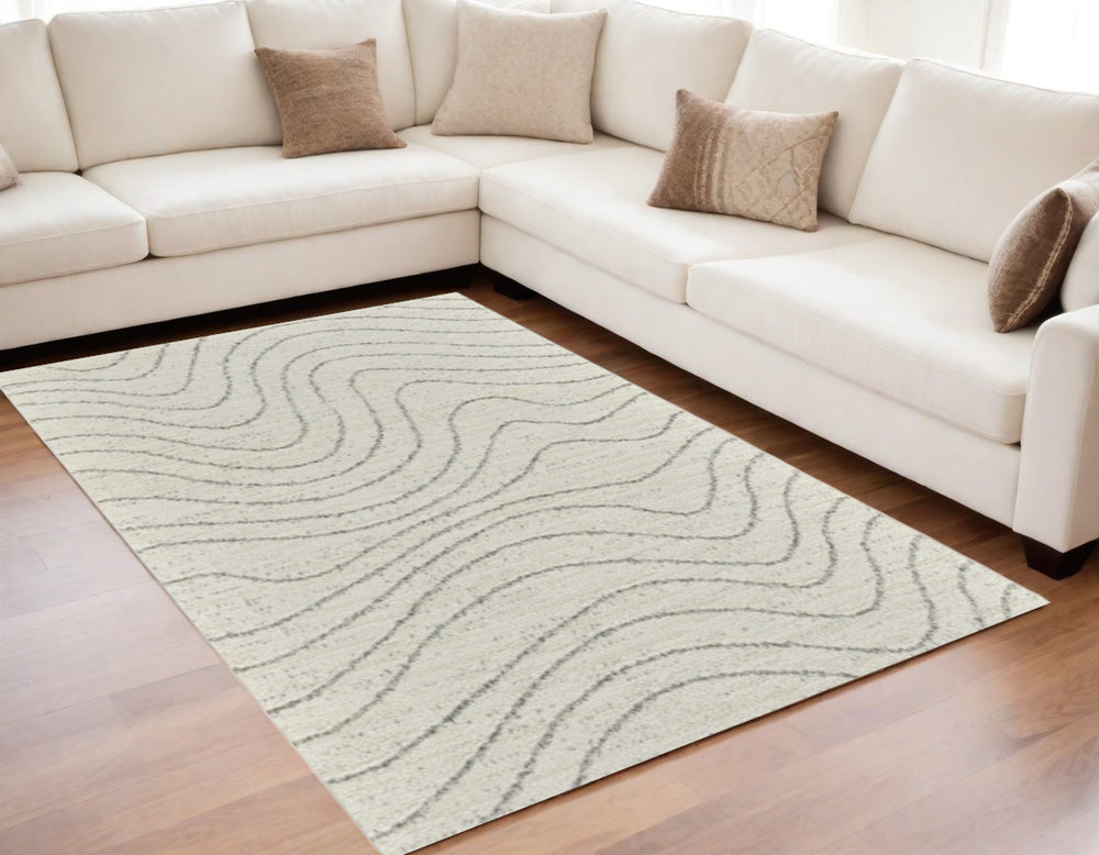 Homeroots 5' X 8' Cream And Beige Abstract Area Rug  Polyester 570064