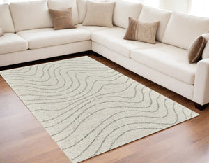 Homeroots 5' X 8' Cream And Beige Abstract Area Rug  Polyester 570064