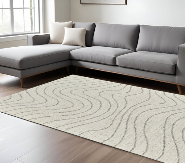 Homeroots 7' X 10' Cream And Beige Abstract Area Rug  Polyester 570065