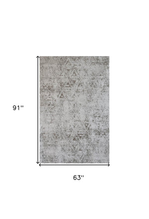 Homeroots 5' X 8' Cream And Beige Abstract Area Rug  Polyester 570088