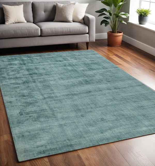 HomeRoots 4' Sea Green and Light Blue Abstract Hand-Woven Area Rug for Luxurious, Modern Home Décor 5' X 8' 570214