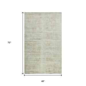 HomeRoots 4' Sand and Ivory Abstract Hand-Woven Area Rug - Artisanal Charm for Cozy, Modern Spaces 4' X 6' 570237