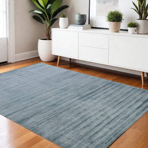 HomeRoots 4' Hand-Woven Striped Area Rug in Light and Dark Blue – Artisan Crafted for Cozy Spaces & Style 4' X 6' 570243