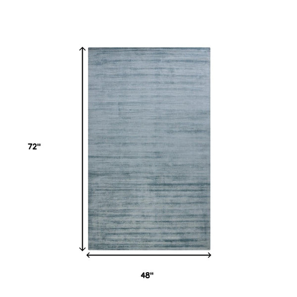HomeRoots 4' Hand-Woven Striped Area Rug in Light and Dark Blue – Artisan Crafted for Cozy Spaces & Style 4' X 6' 570243