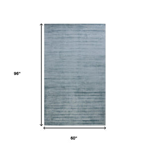 HomeRoots 4' Hand-Woven Striped Area Rug in Light and Dark Blue – Artisan Crafted for Cozy Spaces & Style 5' X 8' 570244
