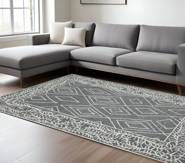 HomeRoots 5' Gray and Ivory Wool Geometric Hand-Hooked Area Rug - Artisanal Warmth for Modern Spaces 9' X 13' 570326