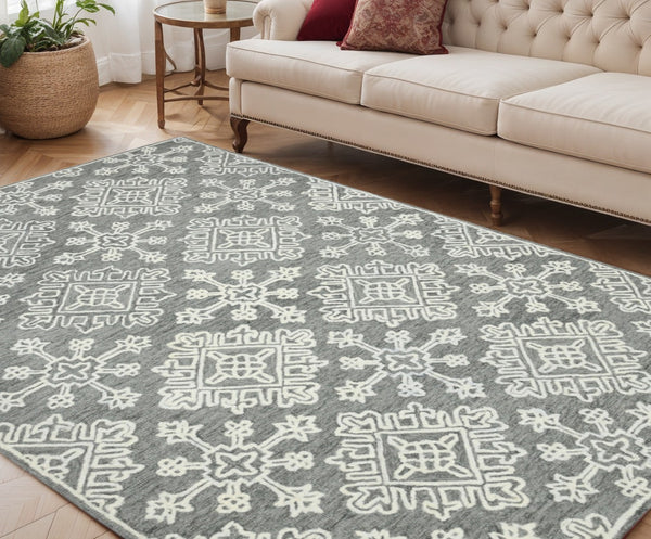 HomeRoots 5' Gray and Ivory Wool Hand-Hooked Oriental Area Rug – Artisanal Charm for Any Interior Space 5' X 7' 570344