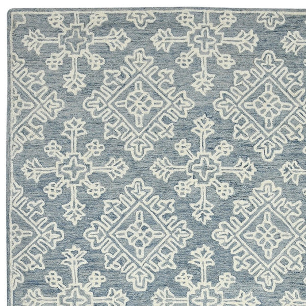 HomeRoots 5' Sky Blue and Ivory Hand-Hooked Wool Oriental Area Rug - Timeless Elegance for Any Space 5' X 7' 570352