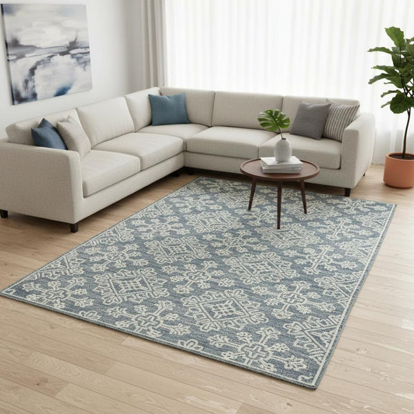 HomeRoots 5' Sky Blue and Ivory Hand-Hooked Wool Oriental Area Rug - Timeless Elegance for Any Space 8' X 11' 570354