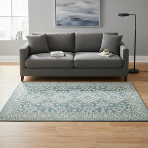 HomeRoots 5' Aqua and Ivory Wool Geometric Area Rug - Hand-Hooked Artisan Design for Modern Spaces, 60" x 90" 5' X 7' 570364