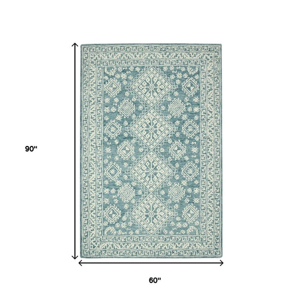 HomeRoots 5' Aqua and Ivory Wool Geometric Area Rug - Hand-Hooked Artisan Design for Modern Spaces, 60" x 90" 5' X 7' 570364