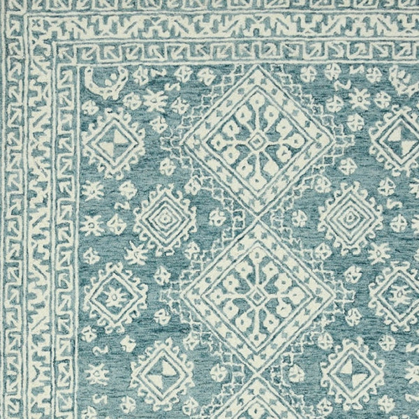 HomeRoots 5' Aqua and Ivory Wool Geometric Area Rug - Hand-Hooked Artisan Design for Modern Spaces, 60" x 90" 8' X 10' 570365