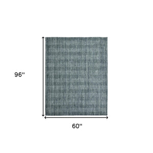 HomeRoots 5' Hand-Woven Blue and Ivory Wool Plaid Area Rug - Timeless Comfort and Style for Any Space 5' X 8' 570487