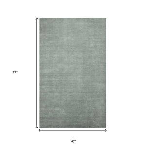 HomeRoots 4' Gray Wool Hand-Woven Area Rug – Artisanal Comfort and Style for Cozy Spaces and Entryways 4' X 6' 570643