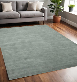 HomeRoots 4' Gray Wool Hand-Woven Area Rug – Artisanal Comfort and Style for Cozy Spaces and Entryways 5' X 8' 570644