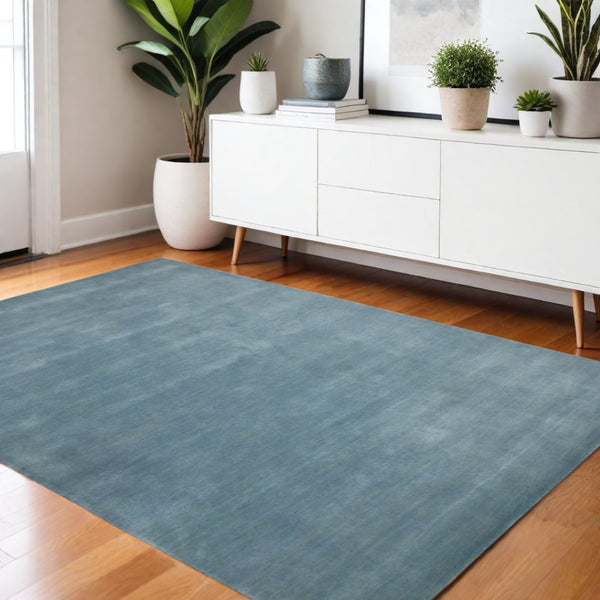 HomeRoots 4' Light Blue Hand-Woven Wool Area Rug - Luxurious, Durable, and Perfect for Any Room Decor 4' X 6' 570655