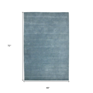 HomeRoots 4' Light Blue Hand-Woven Wool Area Rug - Luxurious, Durable, and Perfect for Any Room Decor 4' X 6' 570655