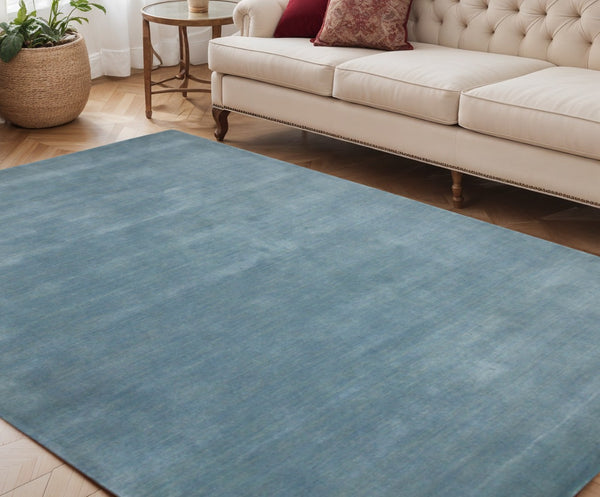 HomeRoots 4' Light Blue Hand-Woven Wool Area Rug - Luxurious, Durable, and Perfect for Any Room Decor 5' X 8' 570656