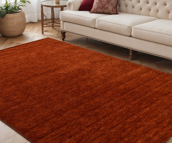 HomeRoots 5' Hand-Woven Red Wool Area Rug - Artisanal Craftsmanship, Plush Comfort, and Timeless Style for Your Home 5' X 8' 570661