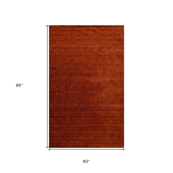 HomeRoots 5' Hand-Woven Red Wool Area Rug - Artisanal Craftsmanship, Plush Comfort, and Timeless Style for Your Home 5' X 8' 570661
