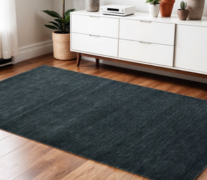 HomeRoots 4' Hand-Woven Dark Gray Wool Area Rug – Artisan Crafted Luxury for Entryways and Cozy Spaces 4' X 6' 570664