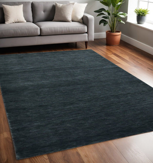 HomeRoots 4' Hand-Woven Dark Gray Wool Area Rug – Artisan Crafted Luxury for Entryways and Cozy Spaces 5' X 8' 570665