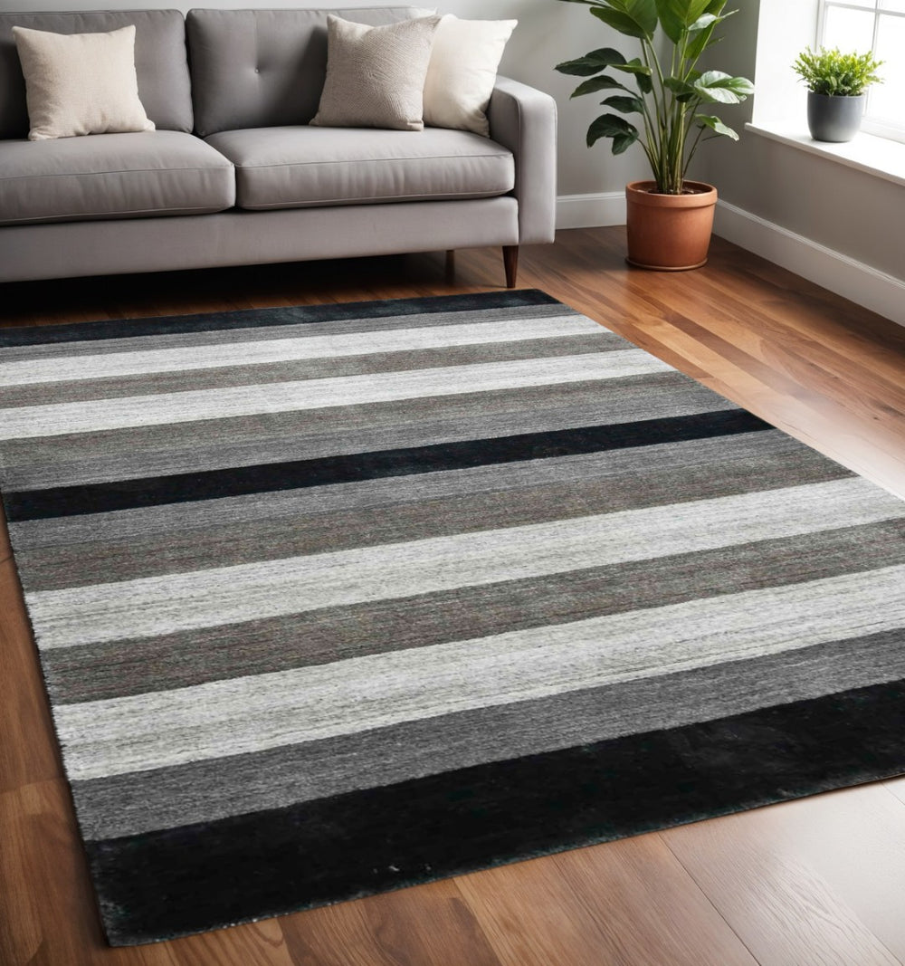 HomeRoots 2' Hand Woven Black and Gray Wool Striped Area Rug for Cozy Spaces - Artisan Crafted Elegance 5' X 8' 570677