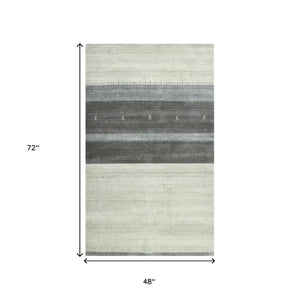 HomeRoots 2' Hand Woven Wool Area Rug in Ivory, Gray & Green – Artisanal Striped Design for Cozy Spaces 4' X 6' 570688