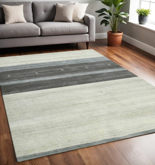 HomeRoots 2' Hand Woven Wool Area Rug in Ivory, Gray & Green – Artisanal Striped Design for Cozy Spaces 5' X 8' 570689