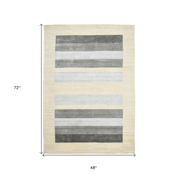 HomeRoots 4' Hand Woven Ivory & Gray Wool Striped Area Rug - Artisan Crafted Comfort for Any Space 4' X 6' 570693
