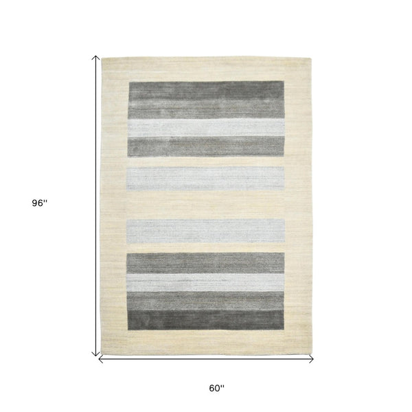 HomeRoots 4' Hand Woven Ivory & Gray Wool Striped Area Rug - Artisan Crafted Comfort for Any Space 5' X 8' 570694