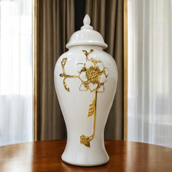 Homeroots 14" White And Gold Floral Urn Ceramic Ginger Jar With Sculptural Details  Ceramic 571621