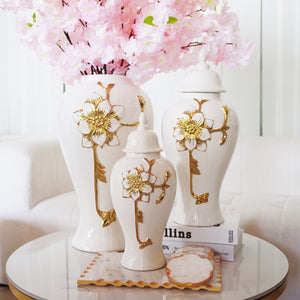 Homeroots 14" White And Gold Floral Urn Ceramic Ginger Jar With Sculptural Details  Ceramic 571621