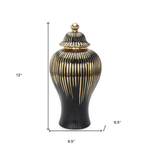 Homeroots 12" Black And Gold Striped Urn Ceramic Ginger Jar - Chic Decorative Accent For Modern Interiors  Ceramic 571631