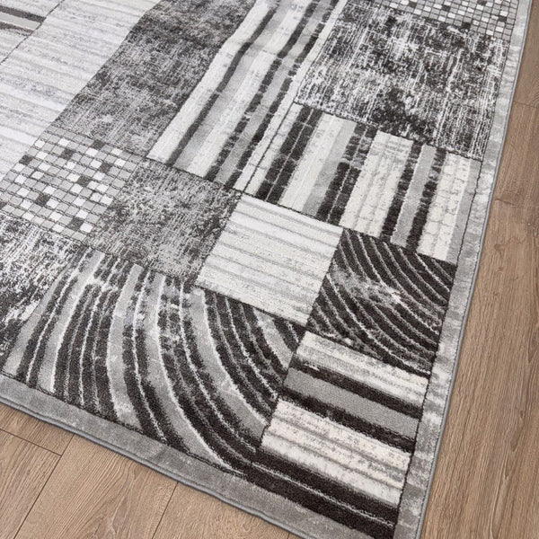 HomeRoots 5' Abstract Area Rug in Gray, Brown & Beige - Modern Design, Stain Resistant, Ideal for Family Spaces 7' X 10' 571686