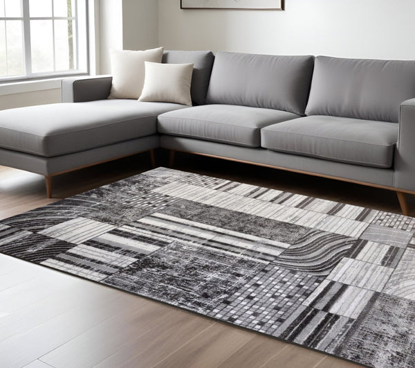 HomeRoots 5' Abstract Area Rug in Gray, Brown & Beige - Modern Design, Stain Resistant, Ideal for Family Spaces 7' X 10' 571686