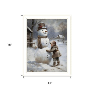 Homeroots Boy Building A Snowman - Charming White Framed Wall Art For Festive Holiday Home Decor 18"X14"  Wood,Paper 572085