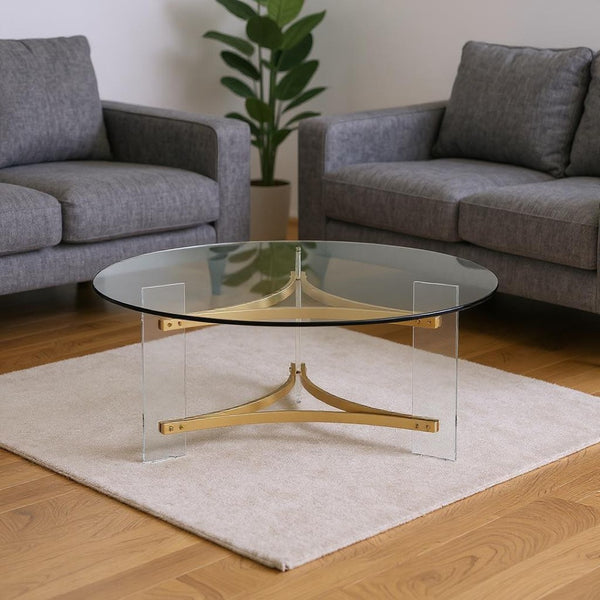 HomeRoots 41" Clear and Gold Round Coffee Table - Chic Acrylic and Brass Design for Modern Living Spaces 572210