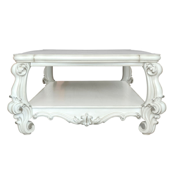 Homeroots 57" White Wood Ornate Coffee Table With Shelf - Chic Design For Stylish Storage & Home Decor!   572270