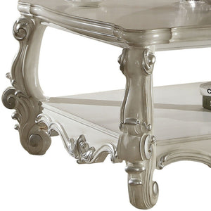 Homeroots 57" White Wood Ornate Coffee Table With Shelf - Chic Design For Stylish Storage & Home Decor!   572270