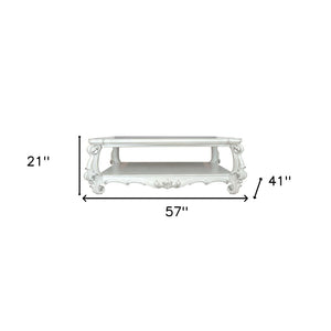 Homeroots 57" White Wood Ornate Coffee Table With Shelf - Chic Design For Stylish Storage & Home Decor!   572270